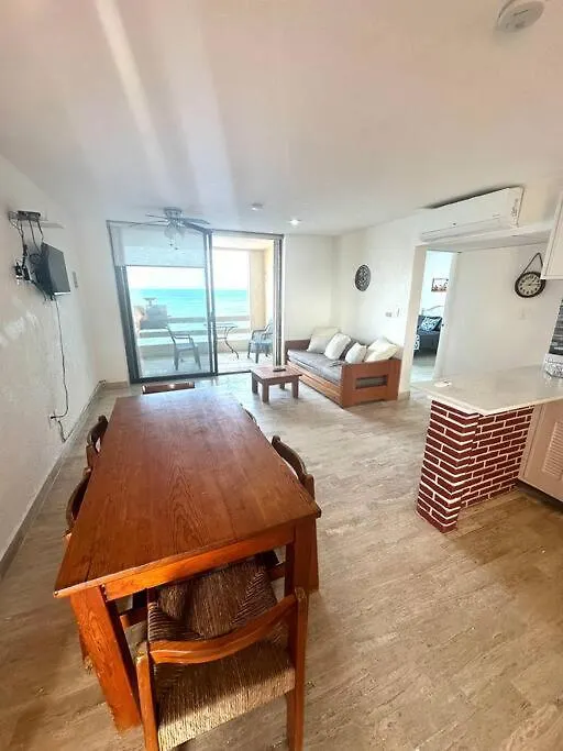 Escape To Serenity By The Sea! Beachfront Apartment With Pool, Just 5 Minutes From The Ferry Cancun 0*,  Mexico